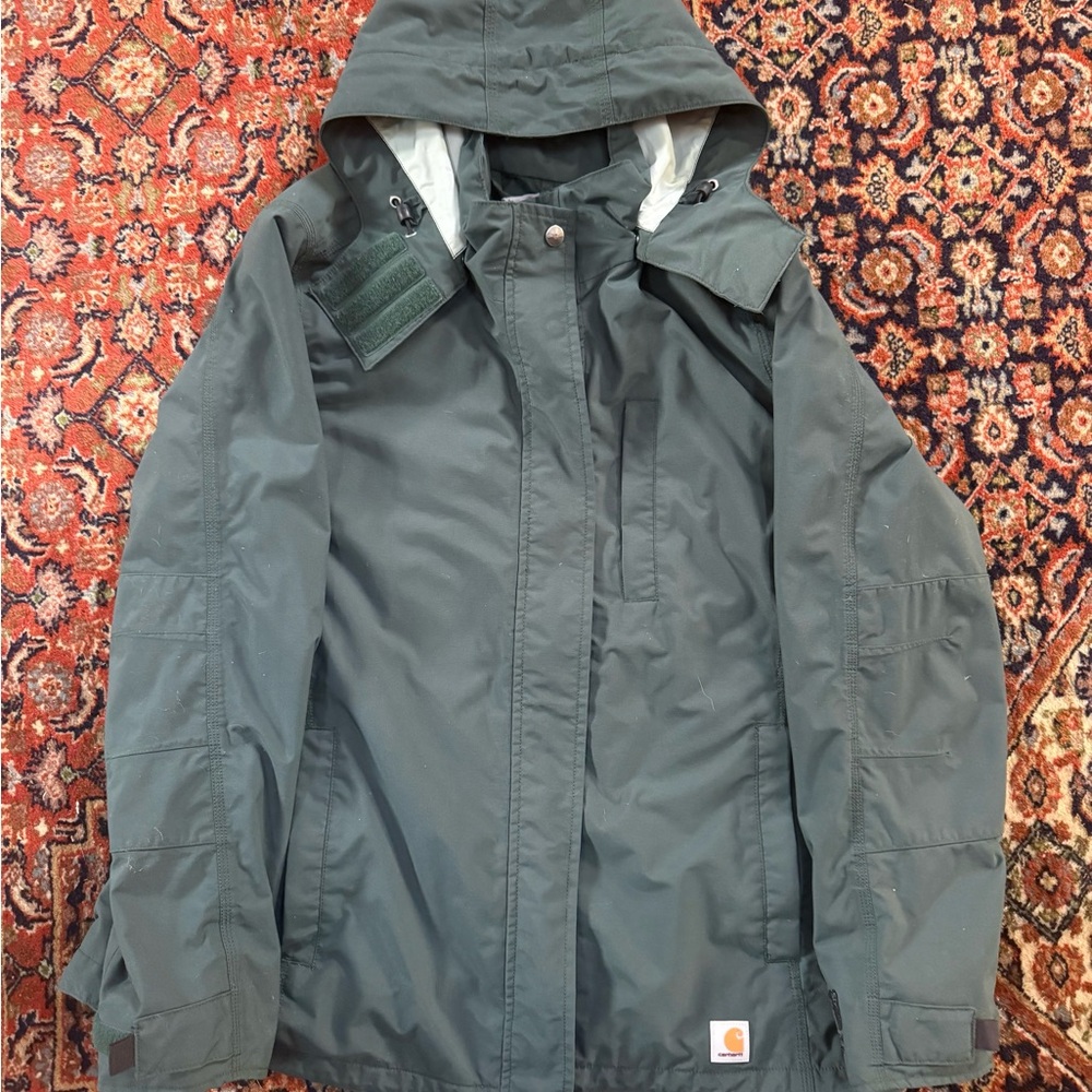 Green women’s Carhartt rain jacket XL